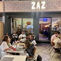 Exterior of restaurant with musicians playing   at ZAZ  in Tamraght