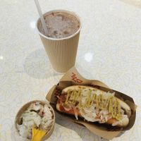 Chocolate malted shake, Ny style dog, potato salad 😋  at Nikki's Not Dog Stand in Sag Harbor