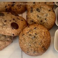 The cookie on the right is vegan and gluten-free (from boulangerie Chambelland) at ARAKU COFFEE in Paris
