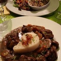 An a-ma-zing Seitan de Bourguignon and my partners dish (Cassoulet de la Mer.) at Le Potager du Marais - Saint Paul in Paris