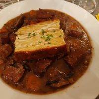 Seitan in red wine sauce with potato gratin at Le Potager du Marais - Saint Paul in Paris
