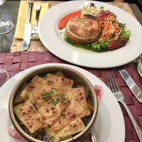 The most delicious French onion soup!  Also pictured is the vegetable pie.   So so good    at Le Potager du Marais - Saint Paul in Paris