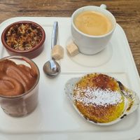 Café gourmand: crème brulée with apricots, chocolate mousse, crumble with red berries, coffee at Le Potager du Marais - Saint Paul in Paris