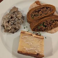 Roast Seitán in a pepper sauce with a side of potatoes and some other thing at Le Potager du Marais - Saint Paul in Paris