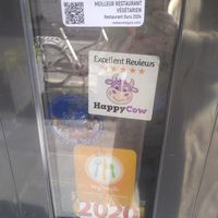 Happy Cow stickers on the door at Le Potager du Marais - Saint Paul in Paris