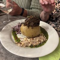 POMME DE TERRE RÔTIE, TAPENADE, PISTOU, GRAINES GERMEES, NOISETTES - definitely a baked potato, not a roast one!  at Le Potager du Marais - Saint Paul in Paris