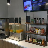 Drink and condiment station. I love that Liquid Aminos is one of the options. at ProteinHouse  in Hudson