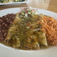 Enchilada made with baby squash (calabacitas). Not vegan by default but they understand how to veganize. I liked it well enough    at Antonio's in Taos