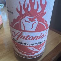 They have a spices and condiments rack. I found this to be very spicy. 🌶️   at Antonio's in Taos