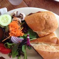 Delicious salad and vegan pulled ";pork"; sandwich! at Cafe Con Leche in Newtown