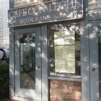 storefront from parking lot in back at Cafe Con Leche in Newtown