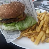 Vegan burger with fries at zum Riesenrad in Vienna