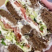 Pumpernickel everything bagel with scallion tofu vegan cream cheese,, added tomato and lettuce  at Bagel Boss in Burbank