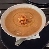 Chilled gazpacho soup for summer, topped with vegan migas (bread).  at Brewer's Fork in Charlestown