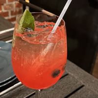 Delicious late-summer rose wine sangria, with watermelon, blueberry, basil leaf.  at Brewer's Fork in Charlestown