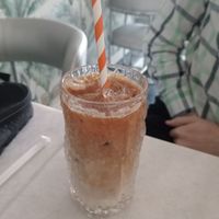 Iced latte with oat milk at Noon Bistro in Lahore