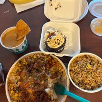 Mashed potato bowl chips and queso and fired rice.  Mmm cupcakes  at The Loaded Bowl in Oklahoma City