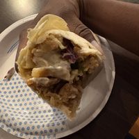 Close up of orange chicken wrap   at The Loaded Bowl in Oklahoma City