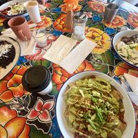 Vegan chilaquiles in bottom plate! Delicious!!!   at Cochinita & Co in Houston