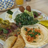 Hummus, salad, aubergine dip, falafel, juicee  at Sips & Dips in Manchester