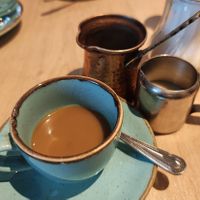 Arabic coffee with oat milk at Sips & Dips in Manchester