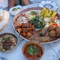 Mixed dips, mujudara, moussaka and garlic dip at Sips & Dips in Manchester
