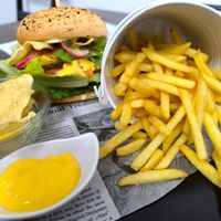 vegan burger + vegan ortila chips + vegan cheese dip + fries😄 at Fajn Food in Povazska Bystrica