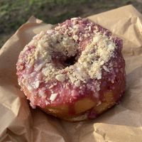Cherry bakewell donut  at Holy Grounds in Preston
