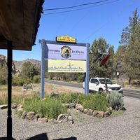 Sign out front   at Juniper Junction in Terrebonne