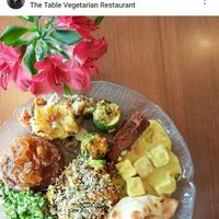 their famous patty, my favorite seaweed salad topped with hemp seeds, tofu samosa, pineapple tempeh and more! at The Table in Ottawa