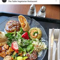 their famous patty, spinach samosa, sweet and sour tofu and more! at The Table in Ottawa