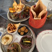 9 Mezze Mix with Falafel (2x), Potatoes, Hummus, Moussaka, stuffed vine leaves, Kibbeh, stuffed aubergine and aubergine creme at Le Mille e Una Notte in Trieste