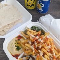 The loaded platter and wrap on the side, accompanied by two simple soda's without any sweetener at Al Wadi Falafel in Wexford