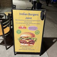 Sign outside  at Indian Burgers Joint in Vancouver