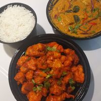 Vegan Chilli Ghobi (front), Soya Champ Masala (back), and rice. at Golden Spoon Vegetarian Restaurant in Abu Dhabi