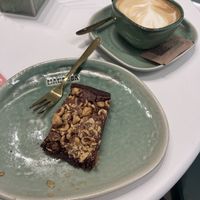 Chocolate Hazelnut Brownie & Oatmilk cappuccino   at Manduca in Barcelona