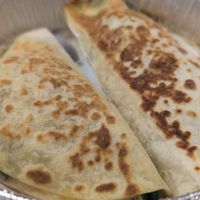 Two vegan cheese and spinach enchiladas at Cinco de Mayo in Palm Coast