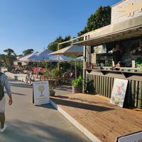 The bar (for ordering) and seating area at Krokodü am CopaBeach in Vienna