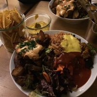 Salad/burger bowl with nachos and cashew cream dip, vegan  at HappenPappen in Hamburg