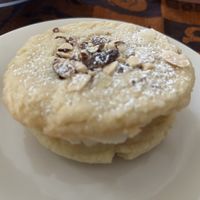 The almond croissant sandwich cookie   at Sweet Haven Bakery in Citrus Heights