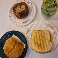 Iced matcha, philly sandwich, 2 varieties of chocolate roll at Café Mila  in Quebec