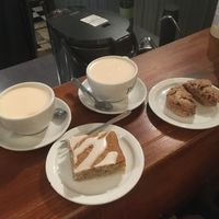 Vegan chai latte (homemade coconut-almond milk), lemon-poppy seeds cake and raspberry-chocolate scone (not vegan)   at Pourquoi Pas Espresso Bar in Montreal