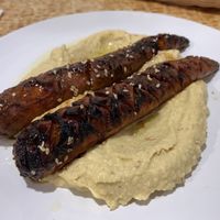 Hummus con zanahoria glaseada, miso y cerveza  at La Mandragora in Valencia