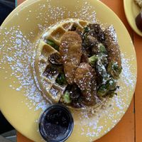 Vegan chicken and waffles with Brussels sprouts and jalapeños  at The Wafflery in Charlotte