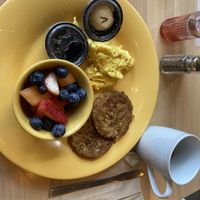 Platter with vegan eggs, vegan sausage, and fruit cup. The sausage and eggs are the classic Mattie’s recipe. It was like seeing an old friend!  at The Wafflery in Charlotte