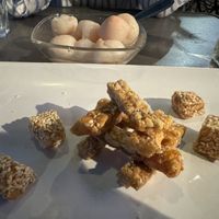 Vegan desserts: Vietnamese nougat (vegan, no honey) and lychees.  at Croq' Nem Le Tai in Avignon
