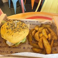 Funny Crispy Chic sandwich and yummy potato wedges  at Flower Burger in Pescara