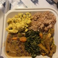 Turnpike, rice and peas, tofu curry, steamed callaloo, and red pea stew  at Reflections Natural Rastarant in Ocho Rios