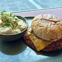 Vegan burger with potato saladd  at Table Dot “Urban Canteen” in Hamburg
