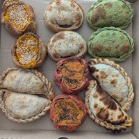 Half dozen empanadas of various flavors at La Veganatta in Buenos Aires